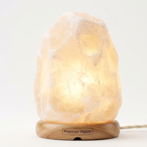 a white salt lamp with cord by premier halite