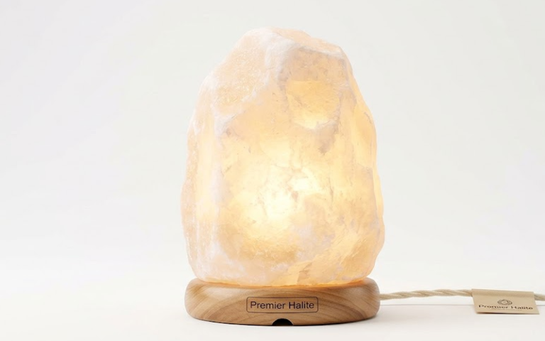 a white salt lamp with cord by premier halite